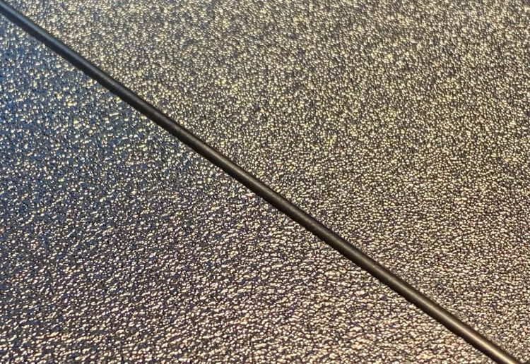 Closeup of plastic with mold texture