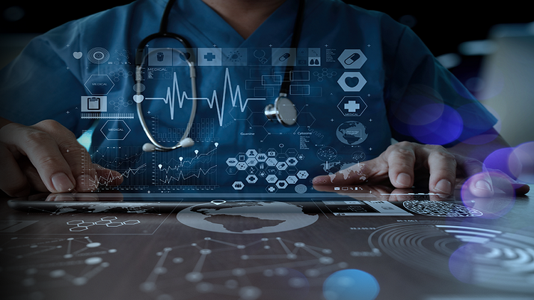 A physician using AI-driven tools to diagnose and treat a patient