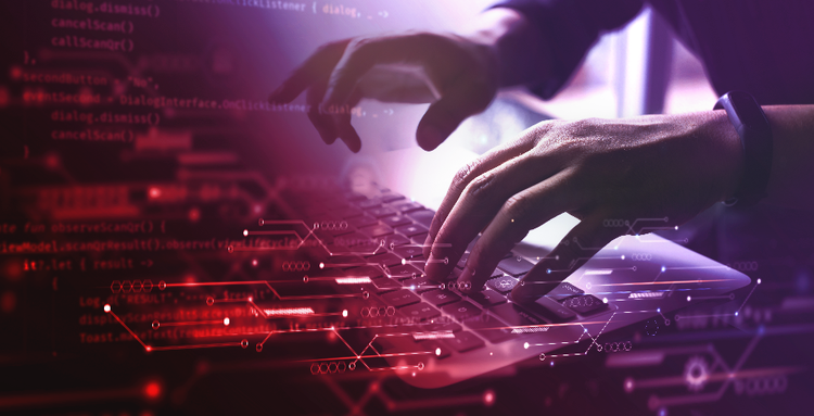 Person typing on laptop