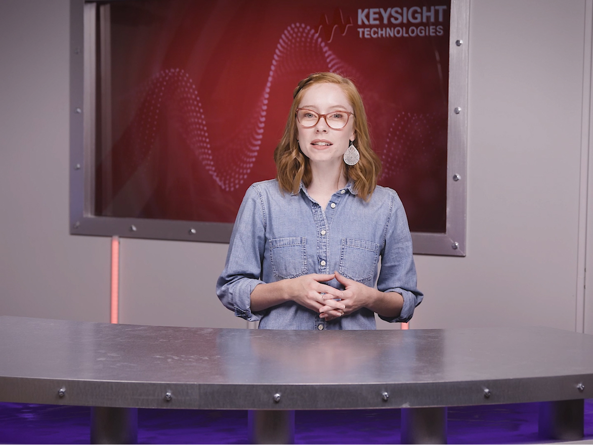 Keysight University teacher presents training behind desk