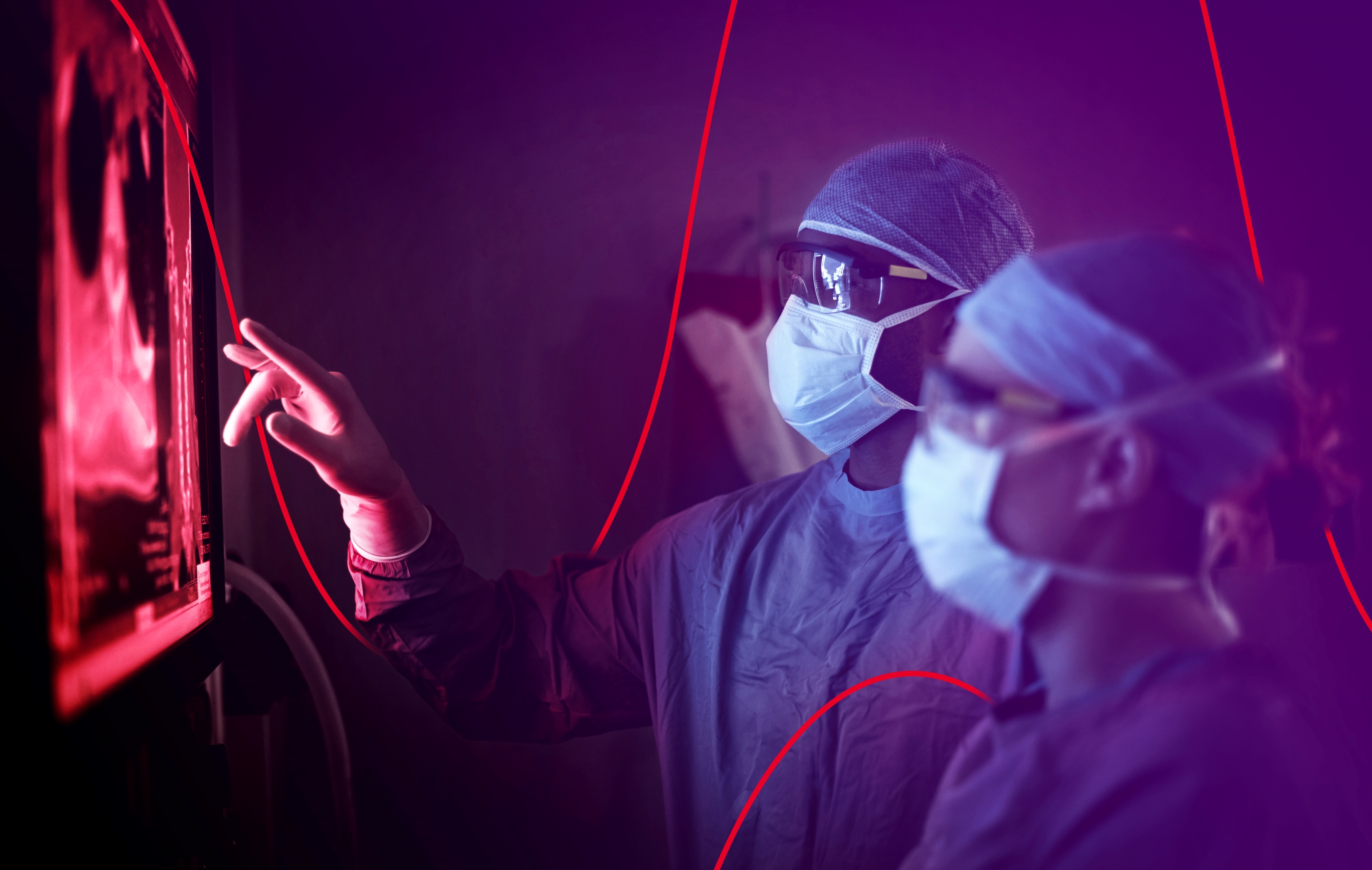 Surgeons looking at an Xray 