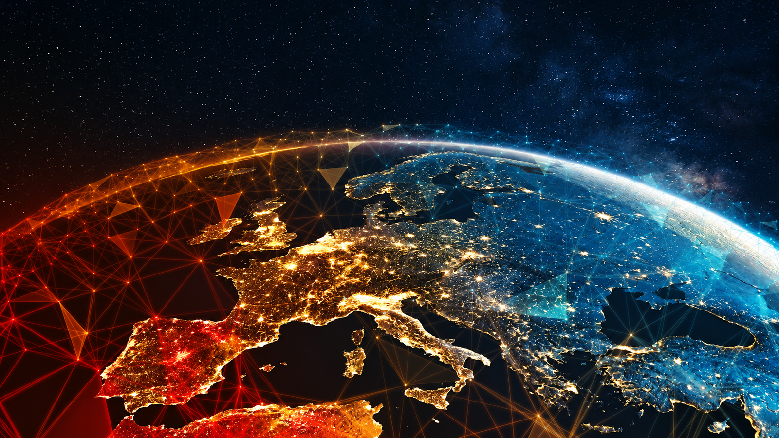 Earth from space at night showing glowing city lights across continents.