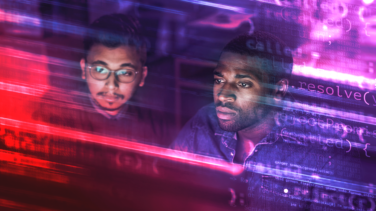 Two people looking at code