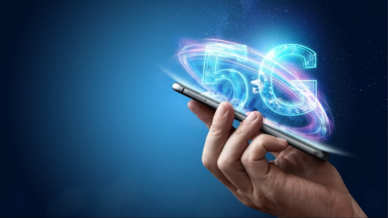 Hand holding a phone with 5G above it